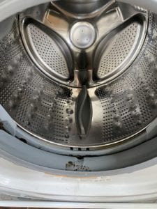 Here's how to clean your washing machine